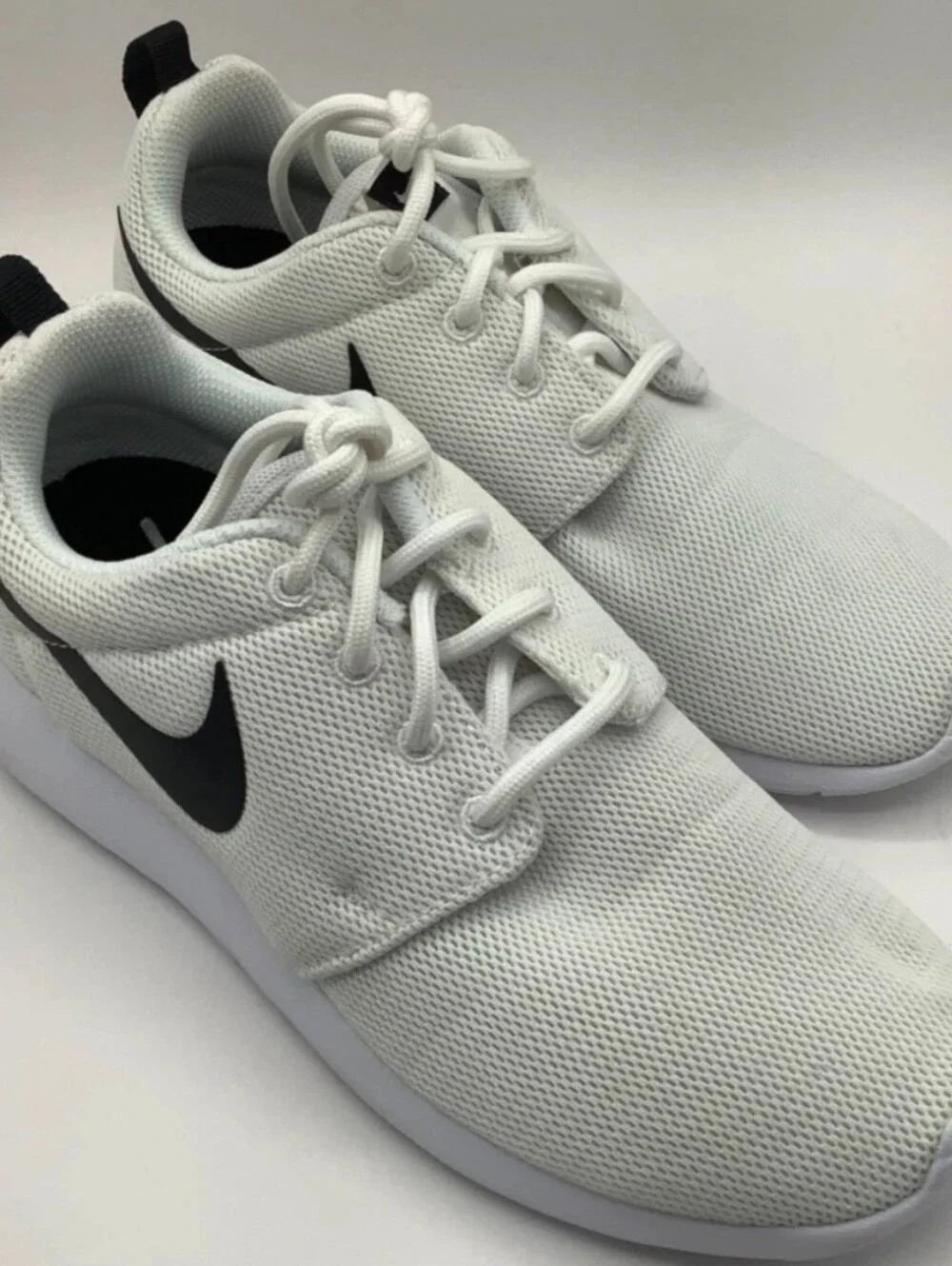 Nike White Mesh Sneakers with Black Swoosh